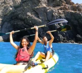 Kayak excursion along volcanic cliffs